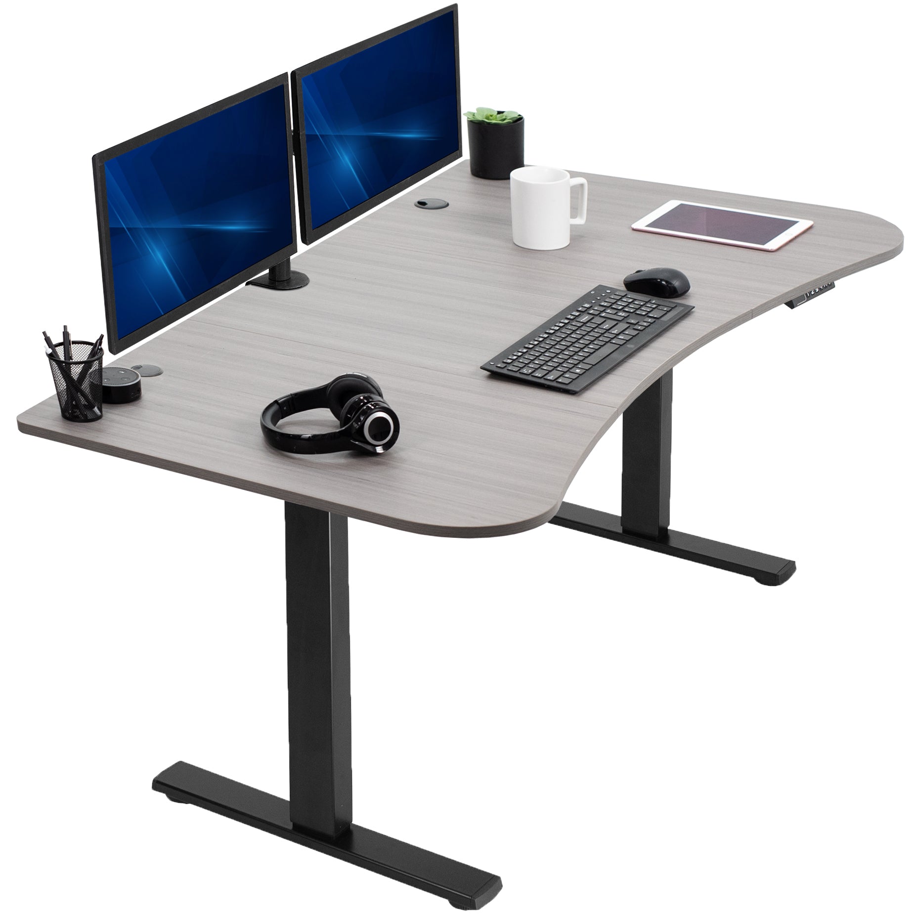 Grey electric, sit to stand, height adjustable desk.