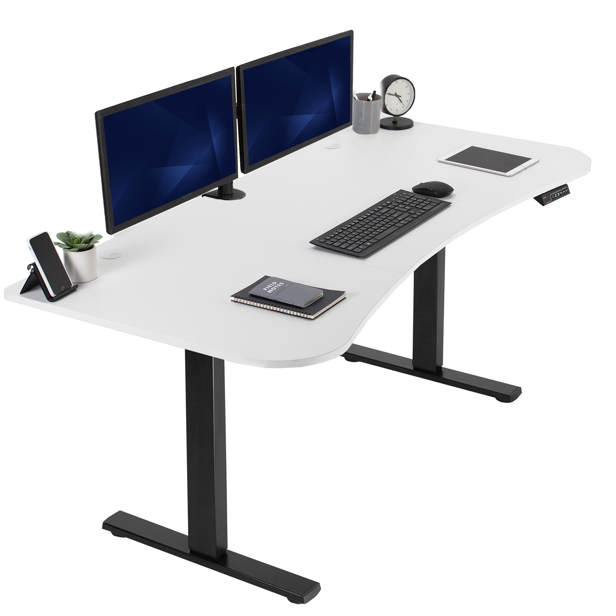 White, electric, sit to stand, height adjustable desk.