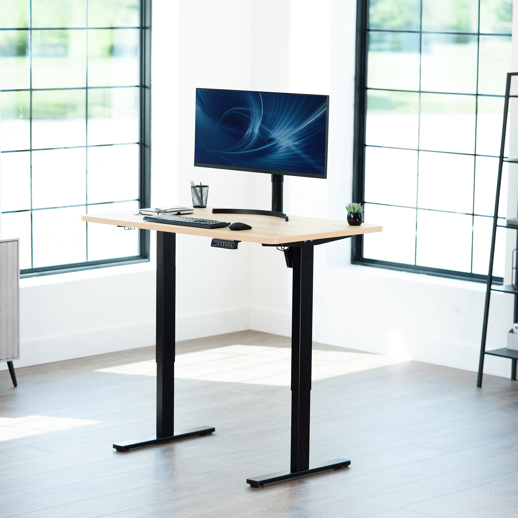 Sturdy ergonomic sit or stand active desk workstation with adjustable height using smart control panel.