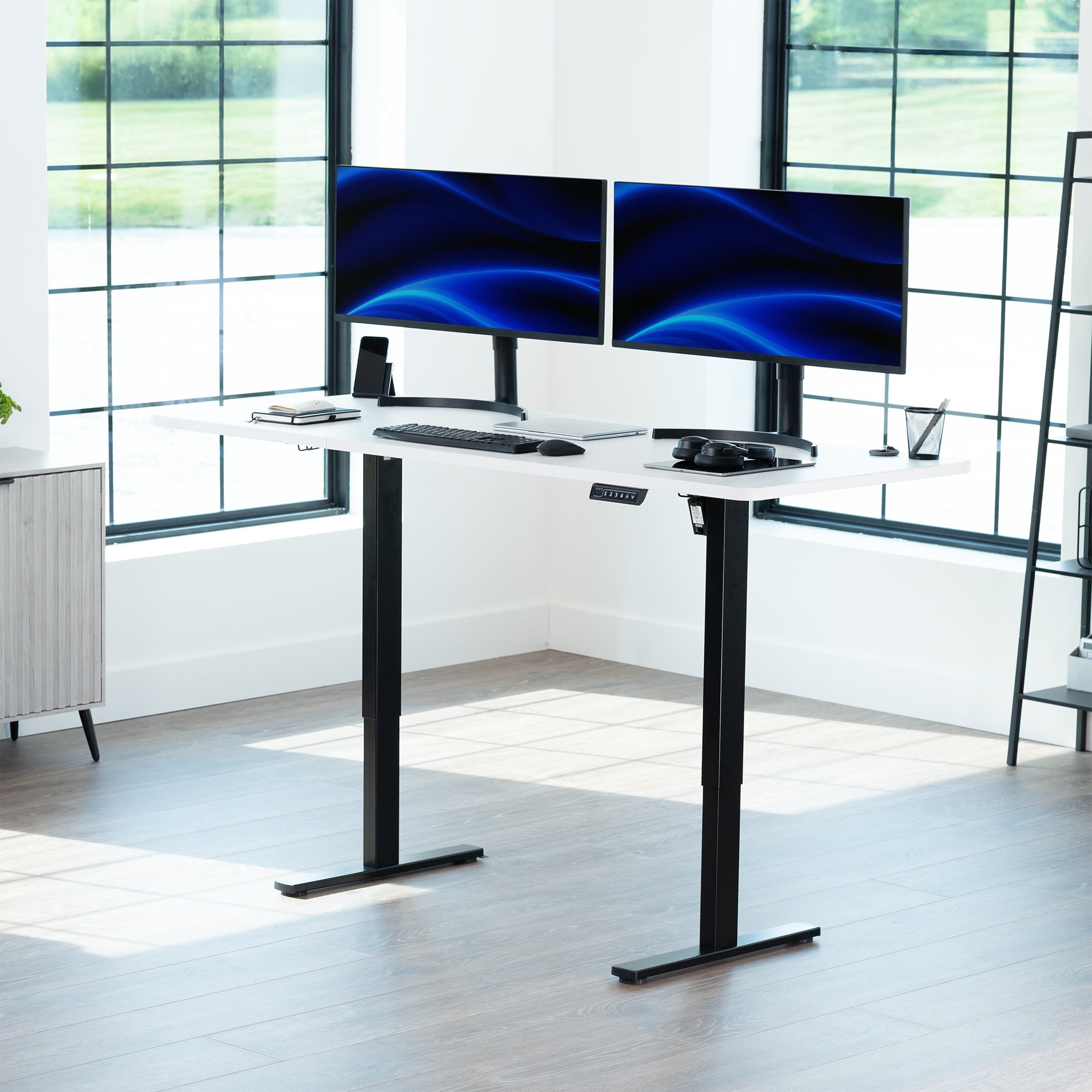 Large sturdy sit or stand modern desk with electric height adjustment options.