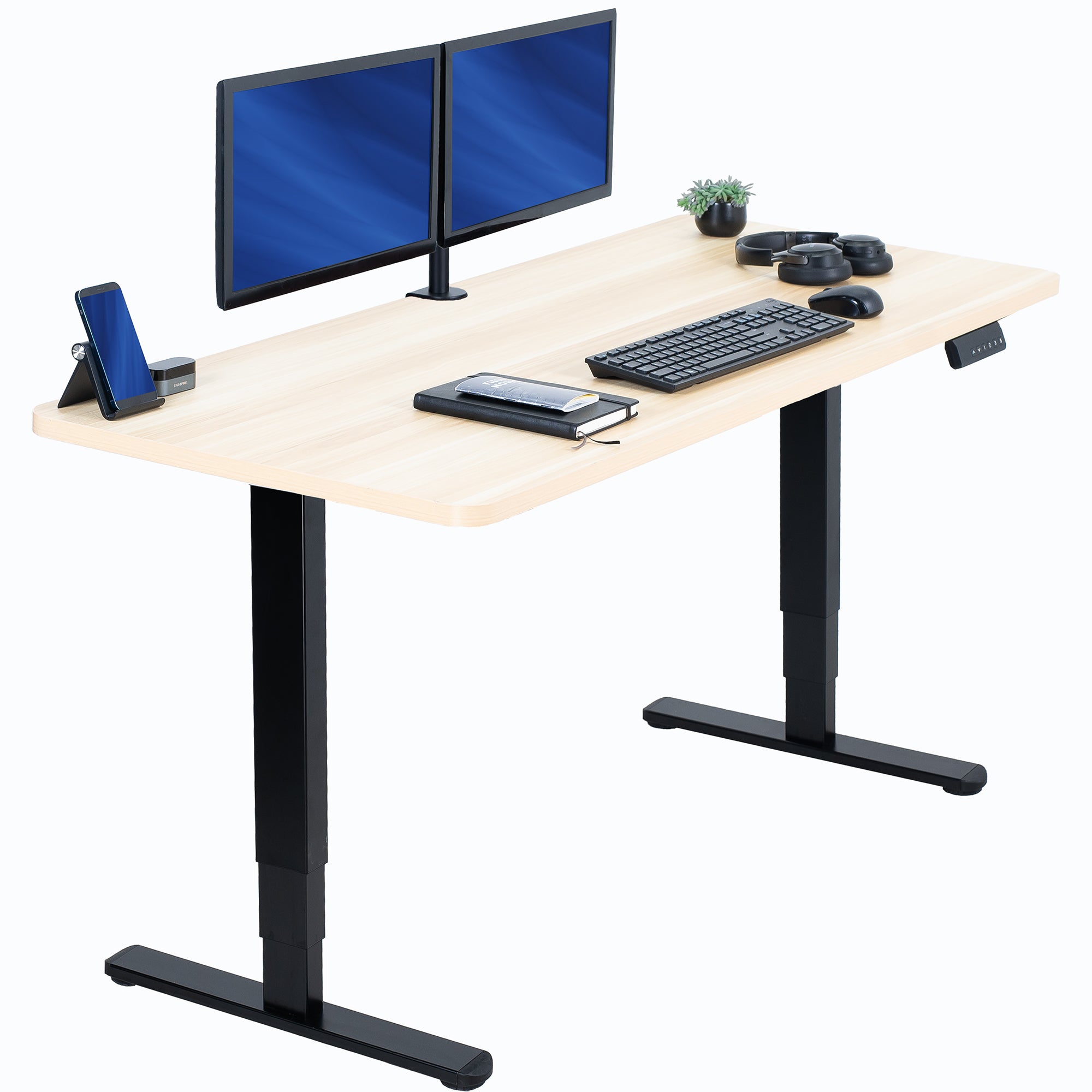 Computer desk with two monitors, keyboard, mouse, and other office items on a white background