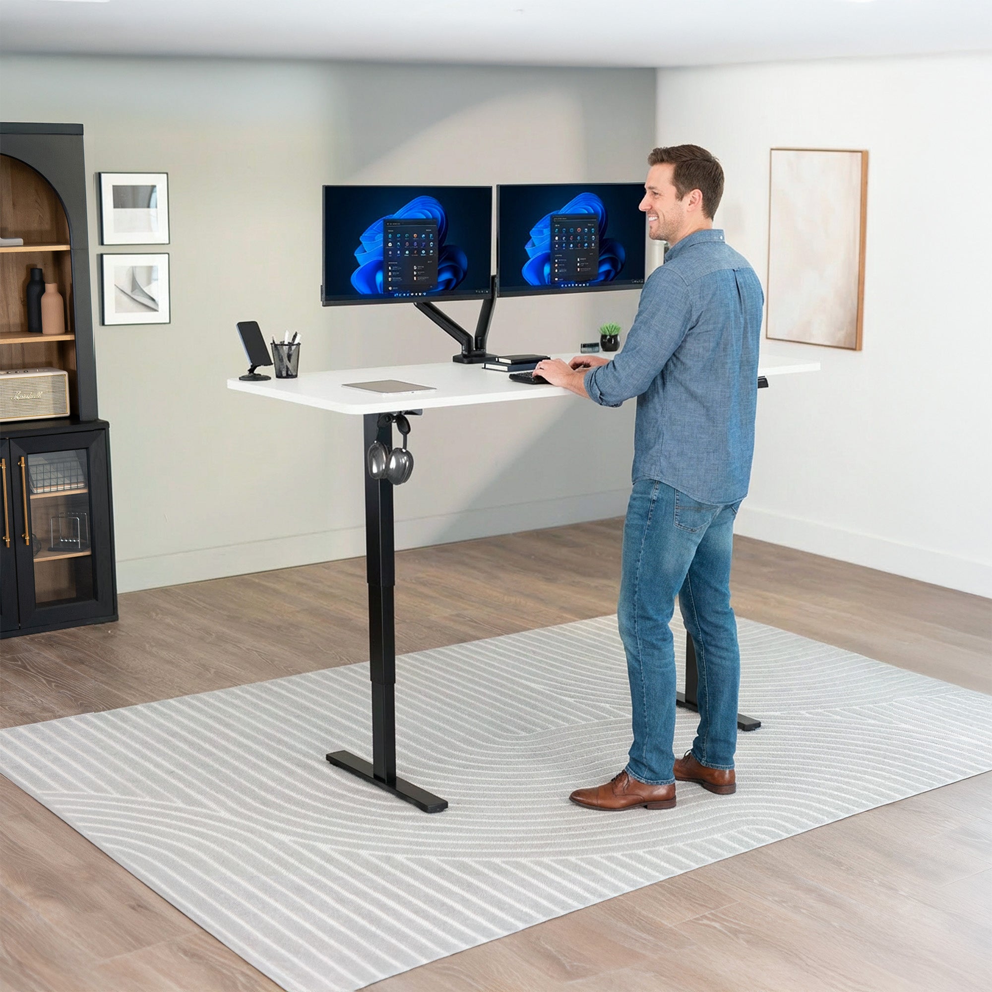 Man Standing at White Desktop 2E Series - 71" x 30" Electric Desk with Touch Screen Memory Controller