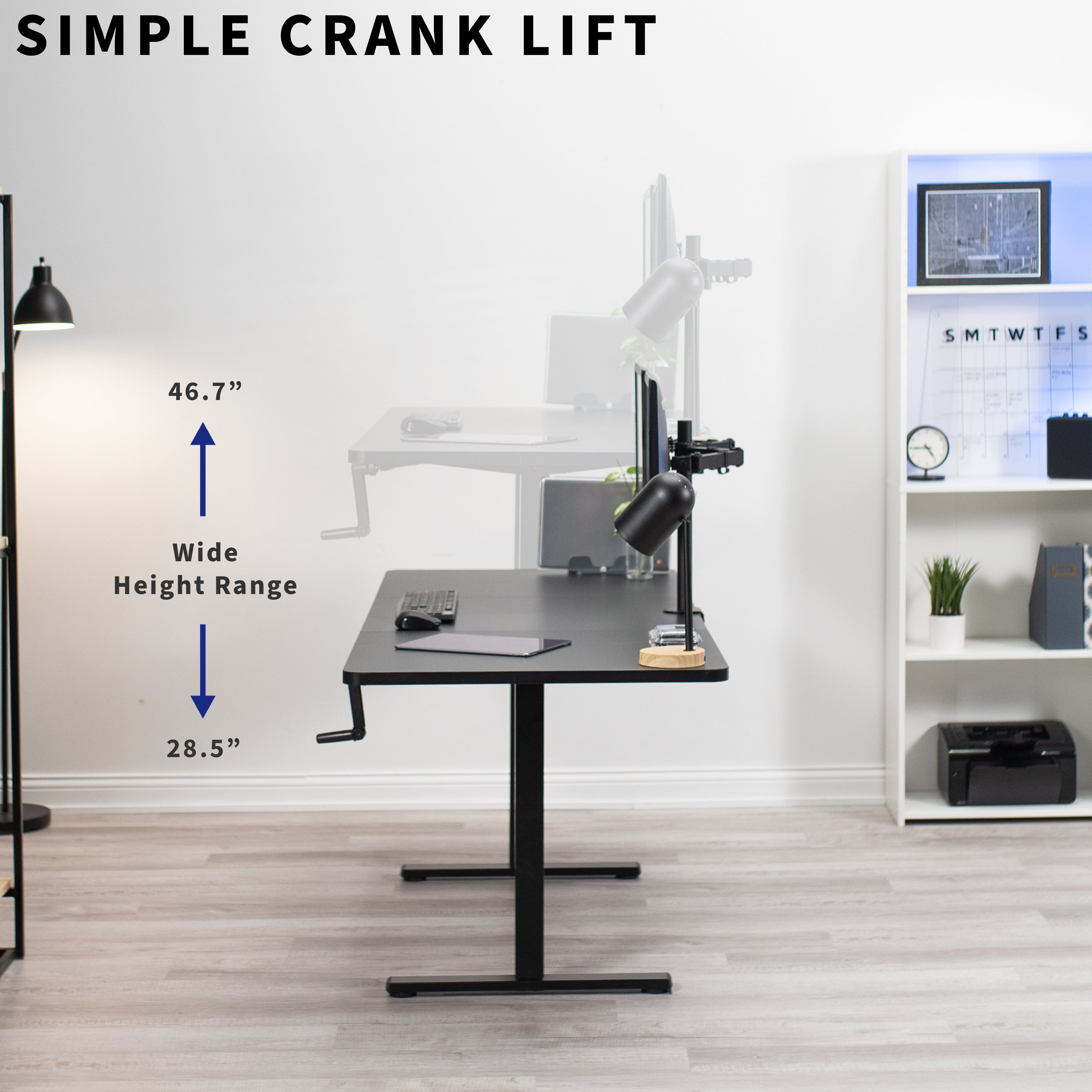 Large three-panel desktop at standing height in an office.