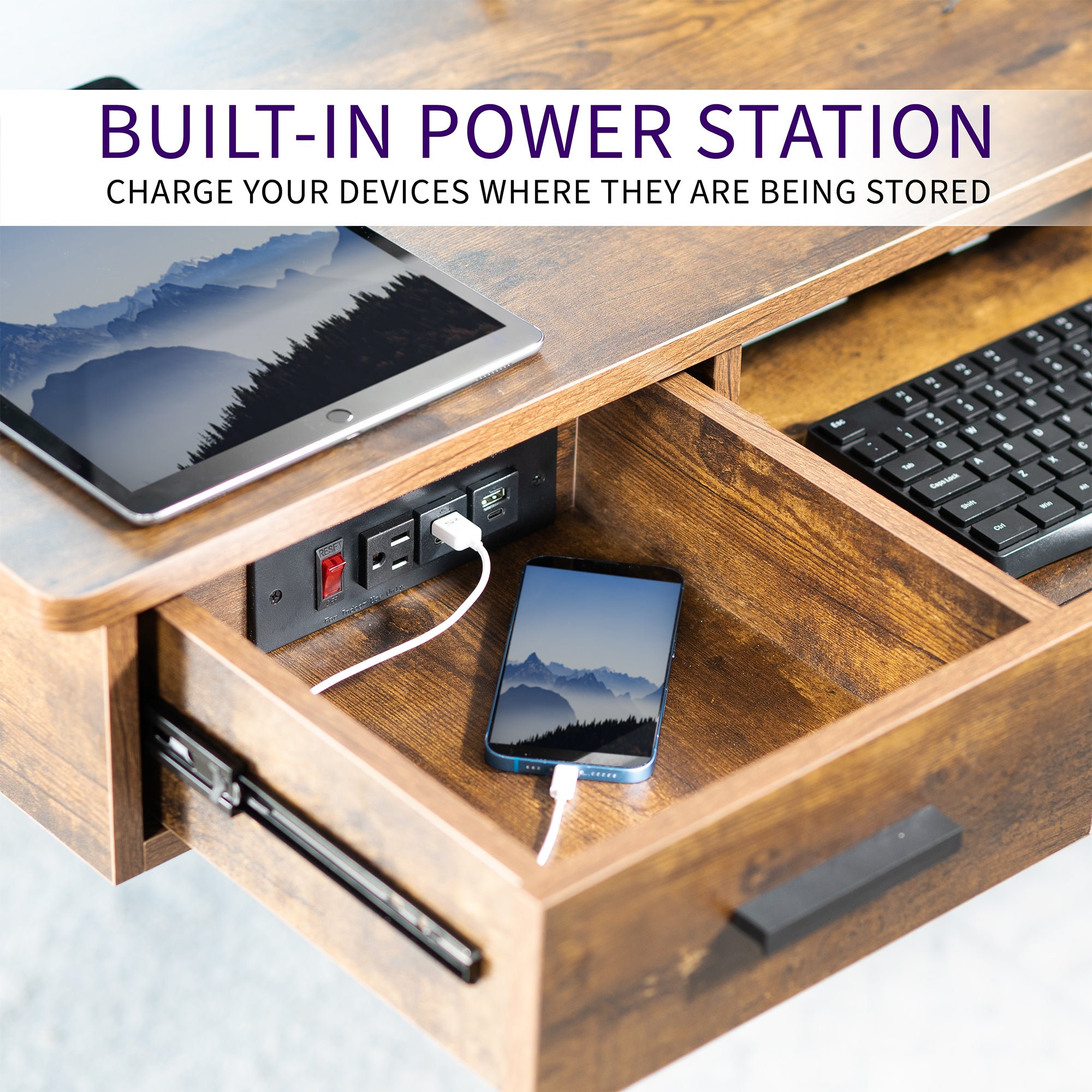 In-drawer charging station with AC outlet and USB ports.