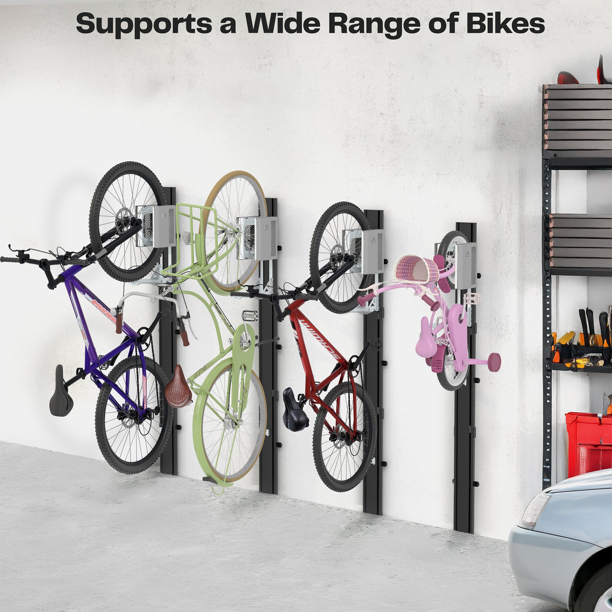 Four various sized bikes mounted on a wall in a garage.