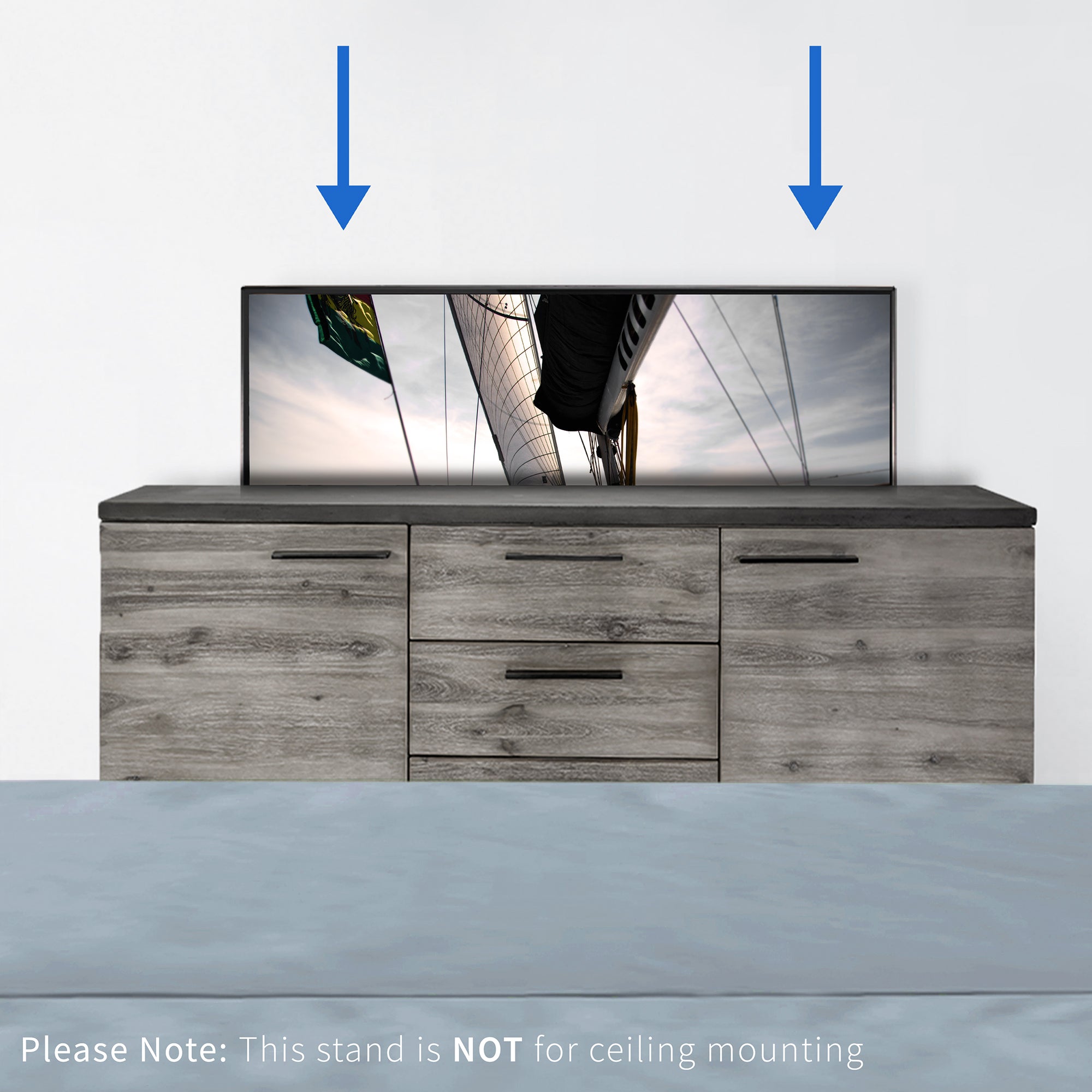 Wooden entertainment console with a TV concealed inside, showing two blue arrows pointing to the stand sliding in.