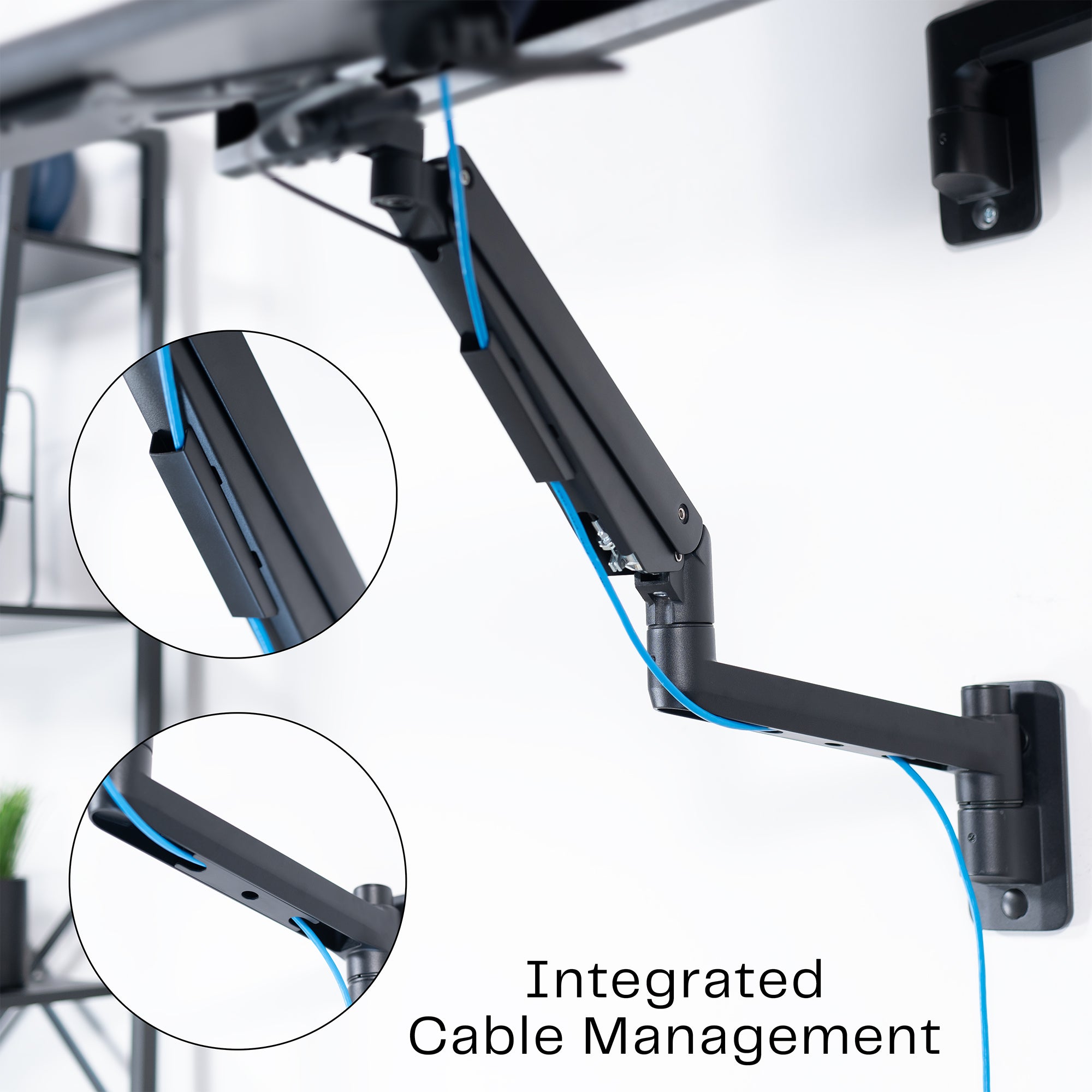 A wall mounted keyboard tray with a pneumatic mechanism with a built-in cable management.