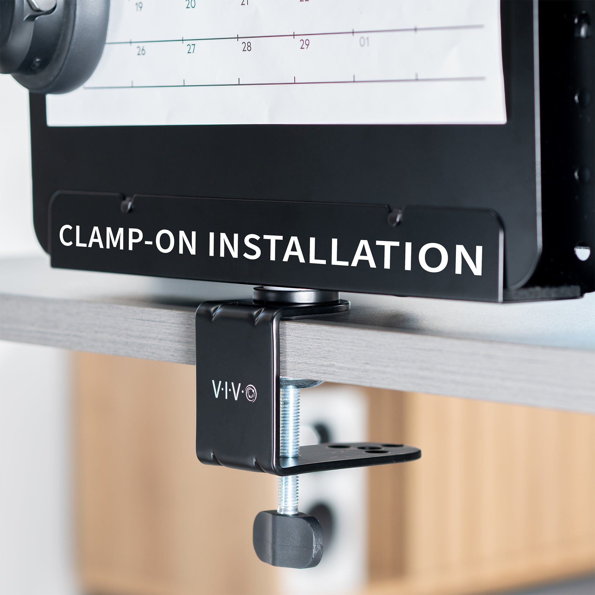 Clamp-on 360-degree rotating pegboard panel with laptop holder for storage and privacy with accessories included. Featuring flexible placement and an easy assembly process.