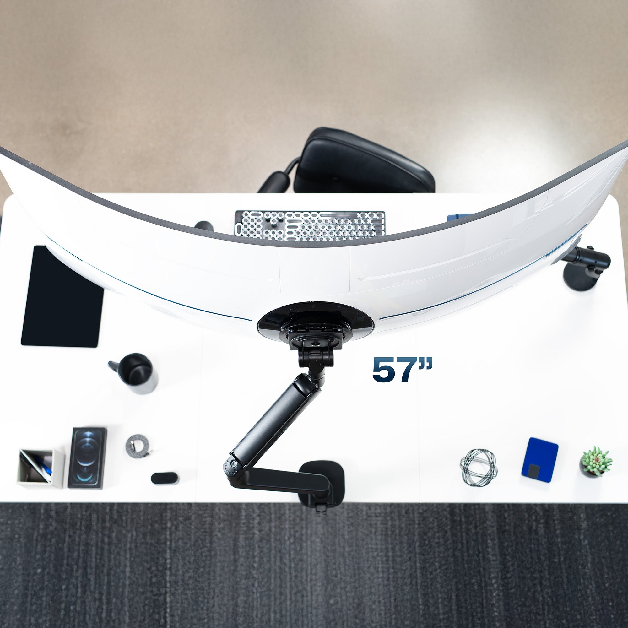 Ultrawide monitor with a adjustable arm in an office