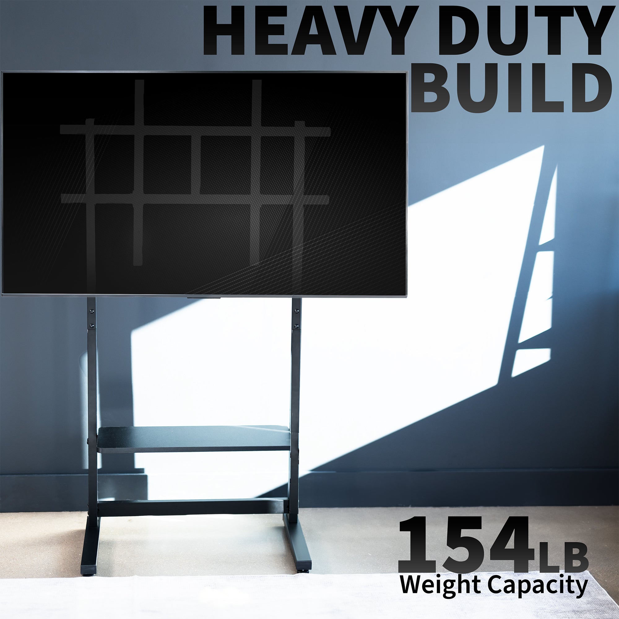 Large flat-screen TV on a heavy duty floor stand with construction features highlighted.