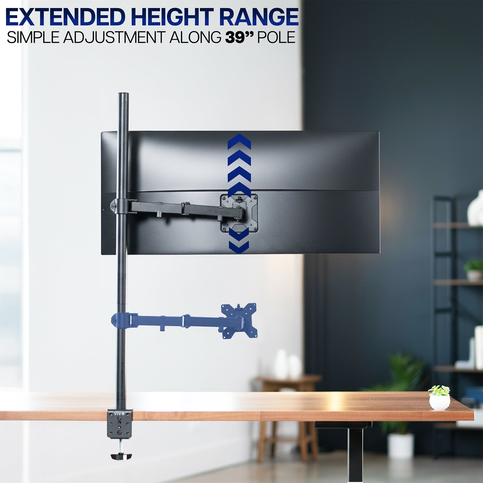 Height adjustment range of extra tall monitor stand mounted to desk in office space.