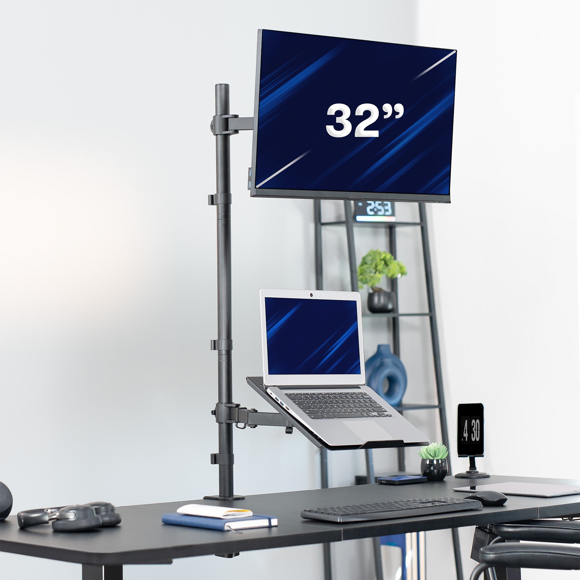 Sturdy single monitor and laptop extra tall desk mount in office space