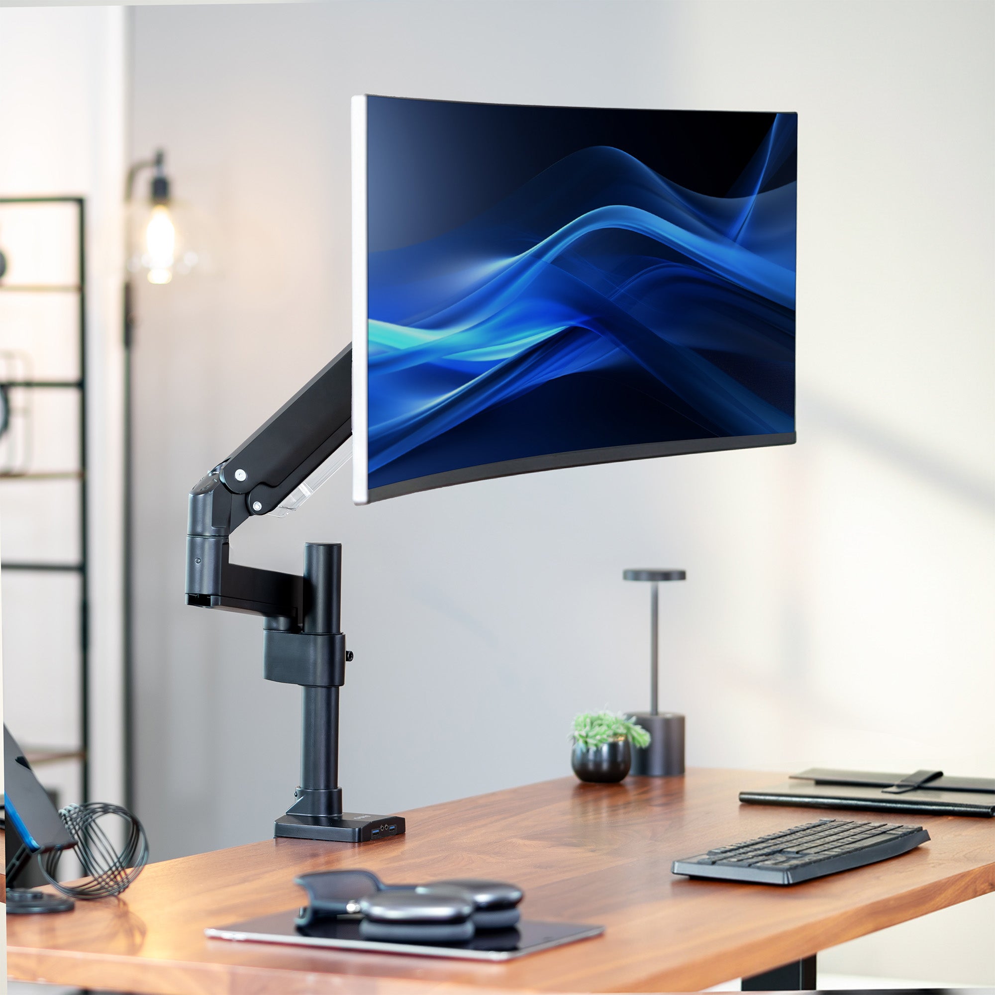 Pneumatic Arm Single Ultrawide Monitor Desk Mount with USB on desk in office space
