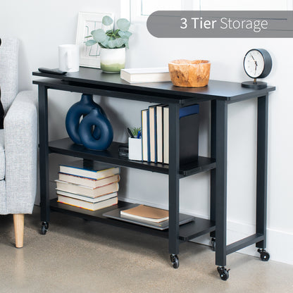 Sleek modern swing out mobile sofa table with shelves and locking wheels.