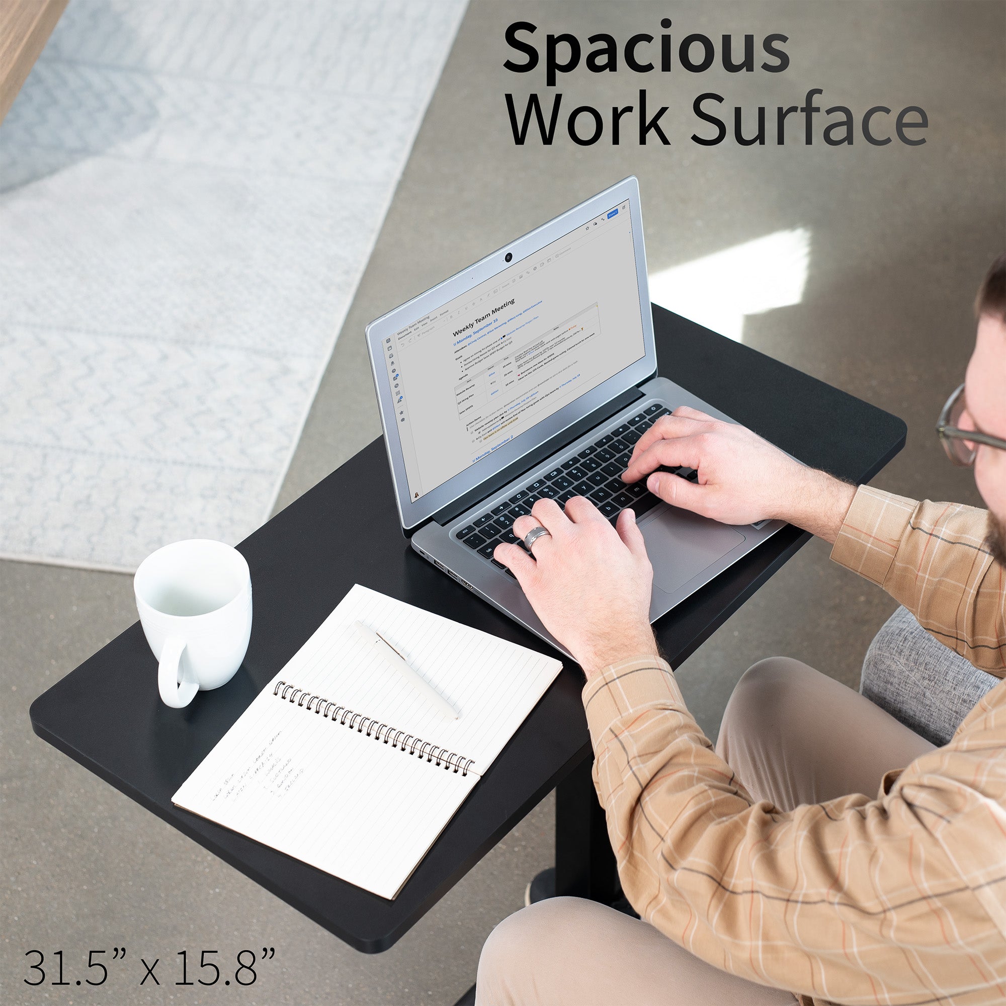 Spacious work surface providing ample space for laptop and accessories