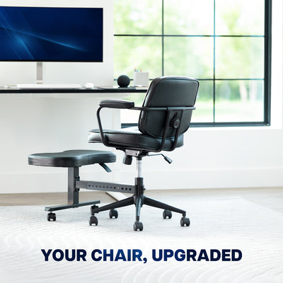 Black office chair with footrest in a modern office setting
