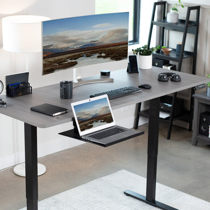 Under desk adjustable laptop tray lets you have comfortable typing angles as you work.