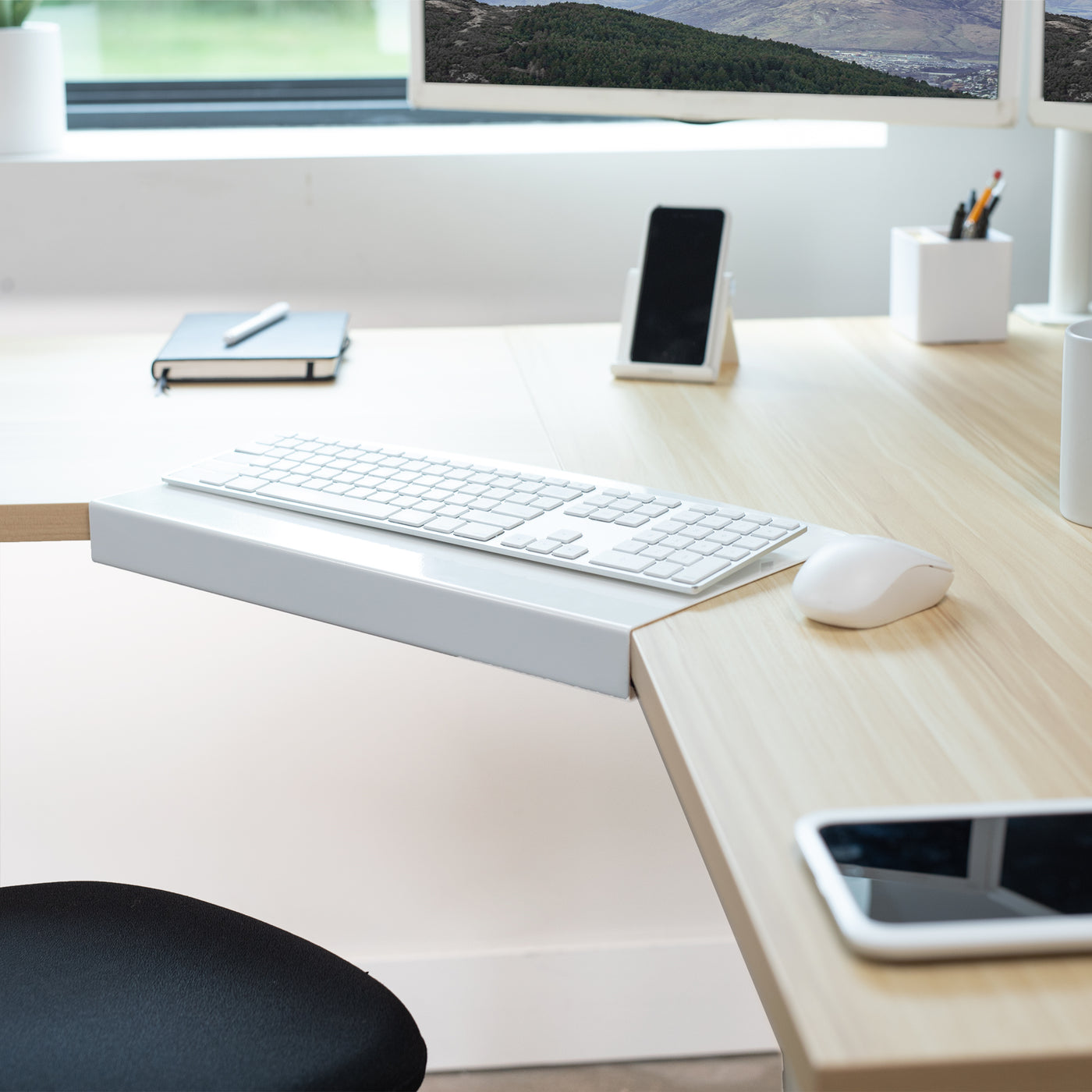 Sleek low-profile design of corner desk connector.