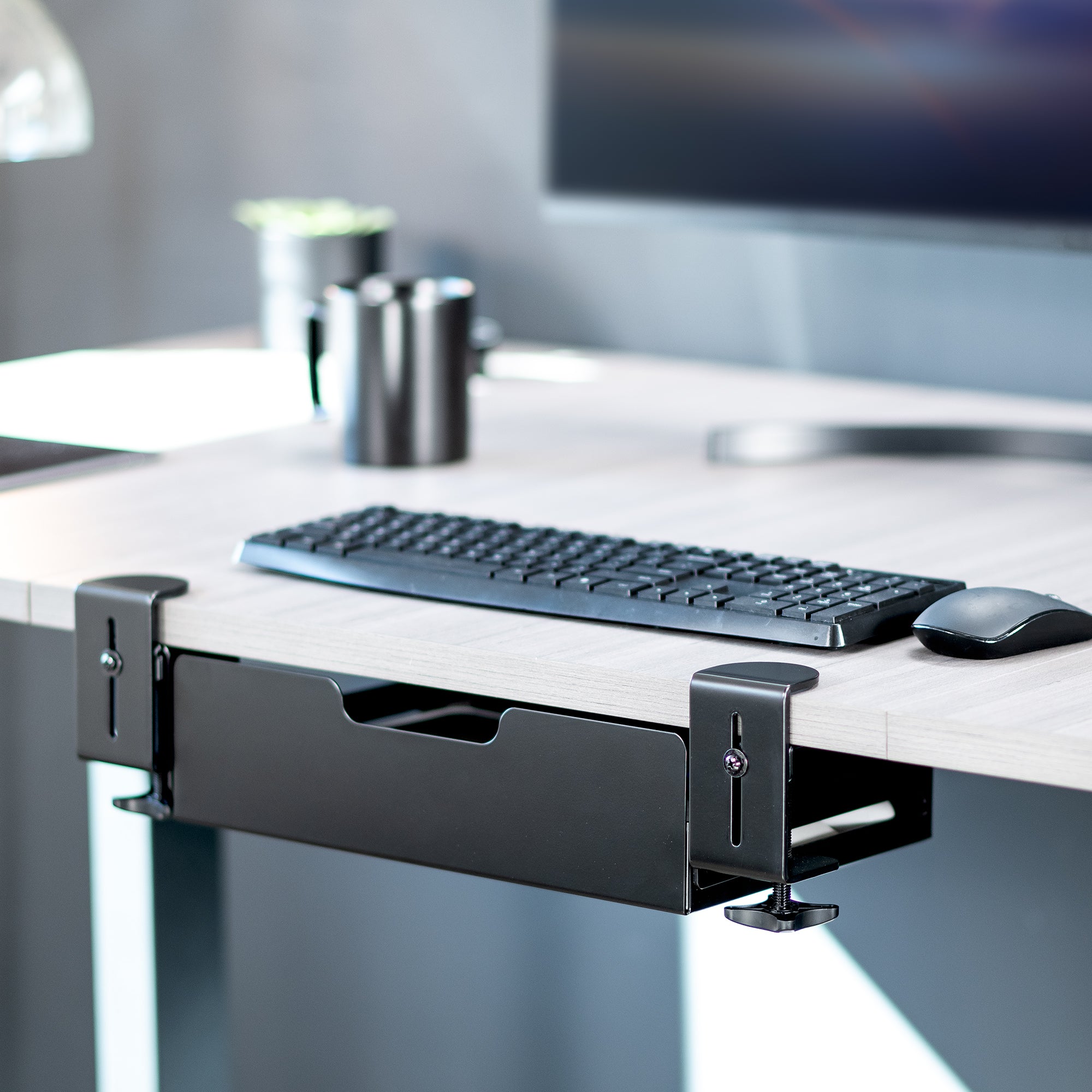 Sturdy low-profile flush under desk clamp-on desk drawer for organization and storage.