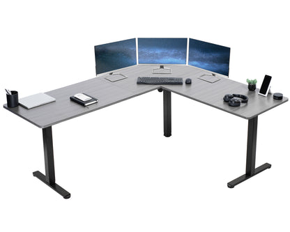 Electric heavy-duty corner desk workstation for modern office workspaces.