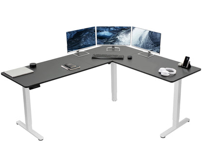 Electric heavy-duty corner desk workstation for modern office workspaces.