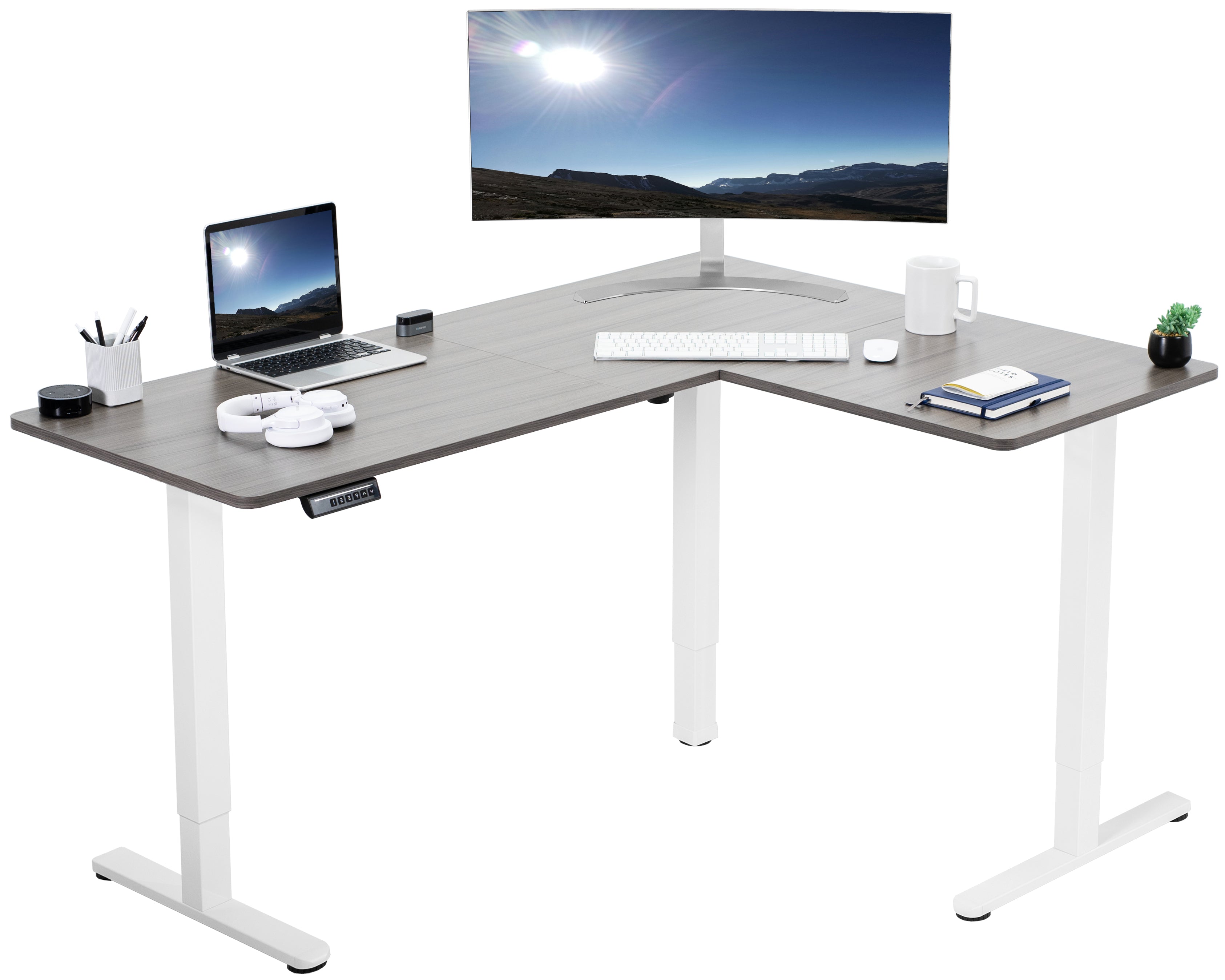 Electric heavy-duty corner desk workstation for modern office workspaces.