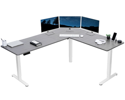 Electric heavy-duty corner desk workstation for modern office workspaces.