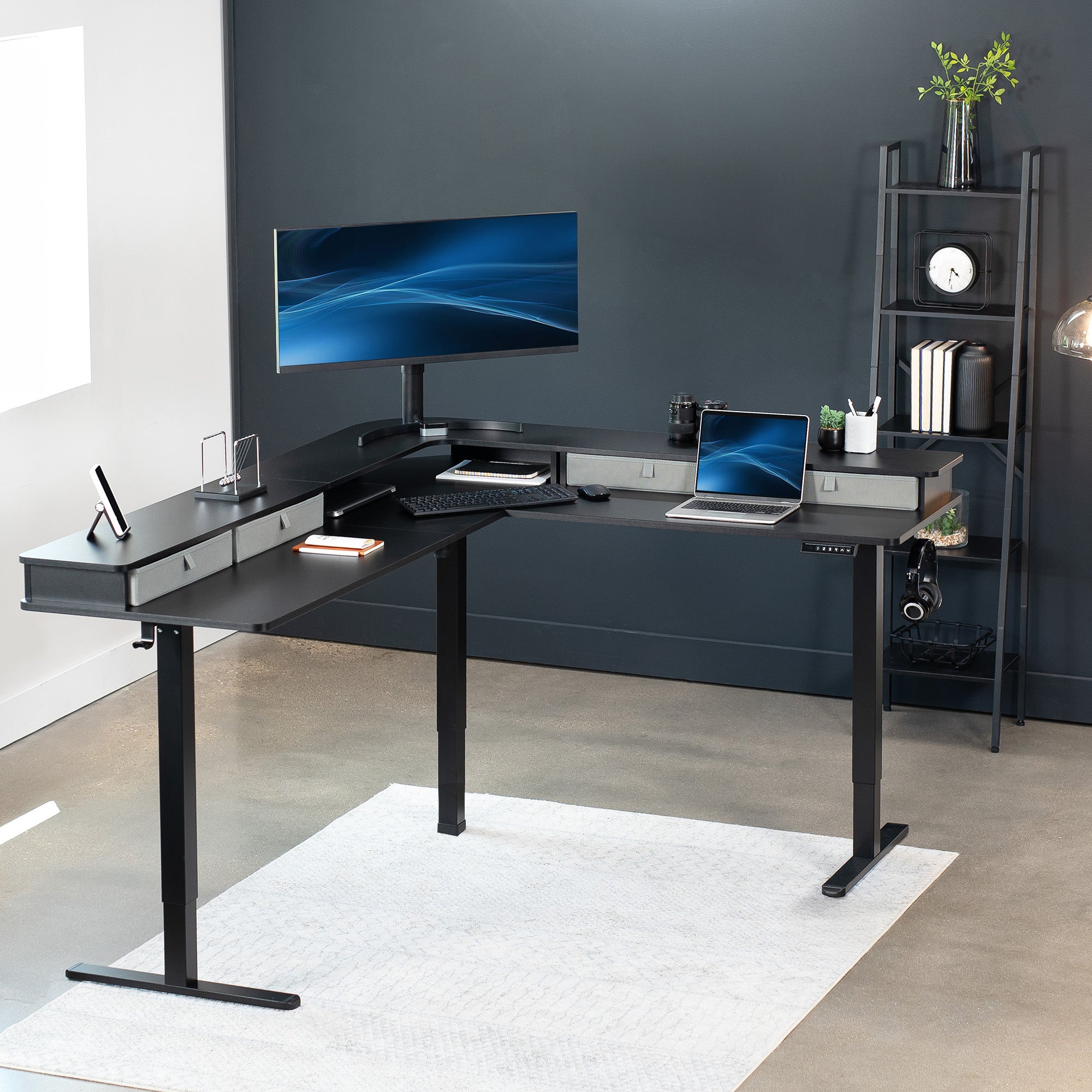 Spacious workstation surface with built-in shelving supporting multiple monitors.