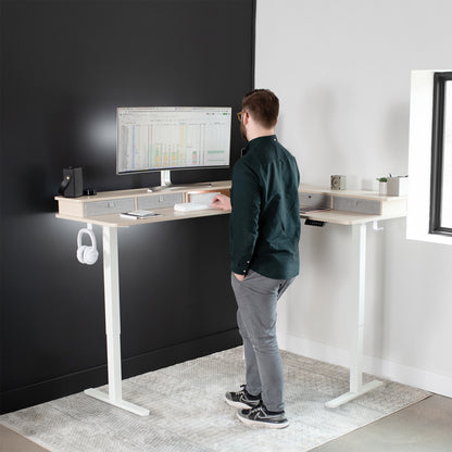 Spacious workstation surface with built-in shelving supporting multiple monitors.