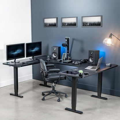 Heavy-duty spacious height adjustable U-shaped electric desk with programmable memory controller.