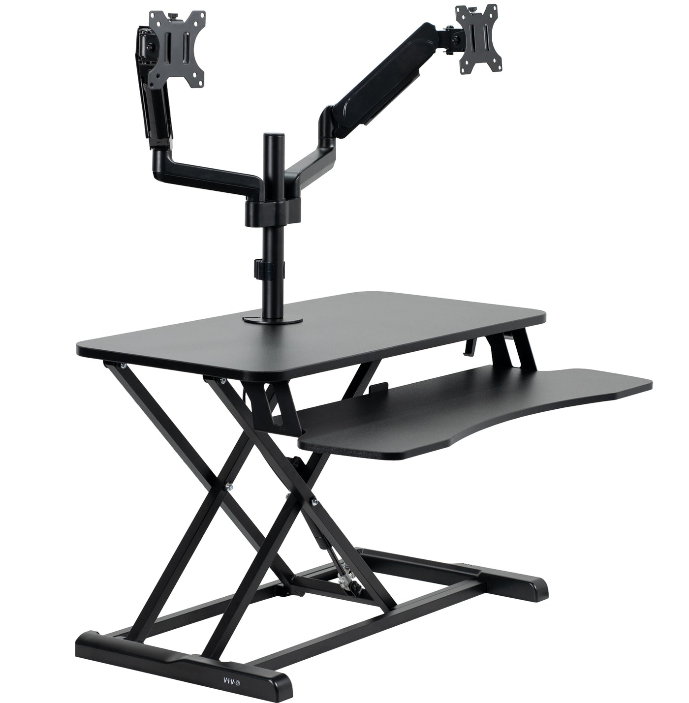Height adjustable desk riser with articulating pneumatic dual monitor mount.