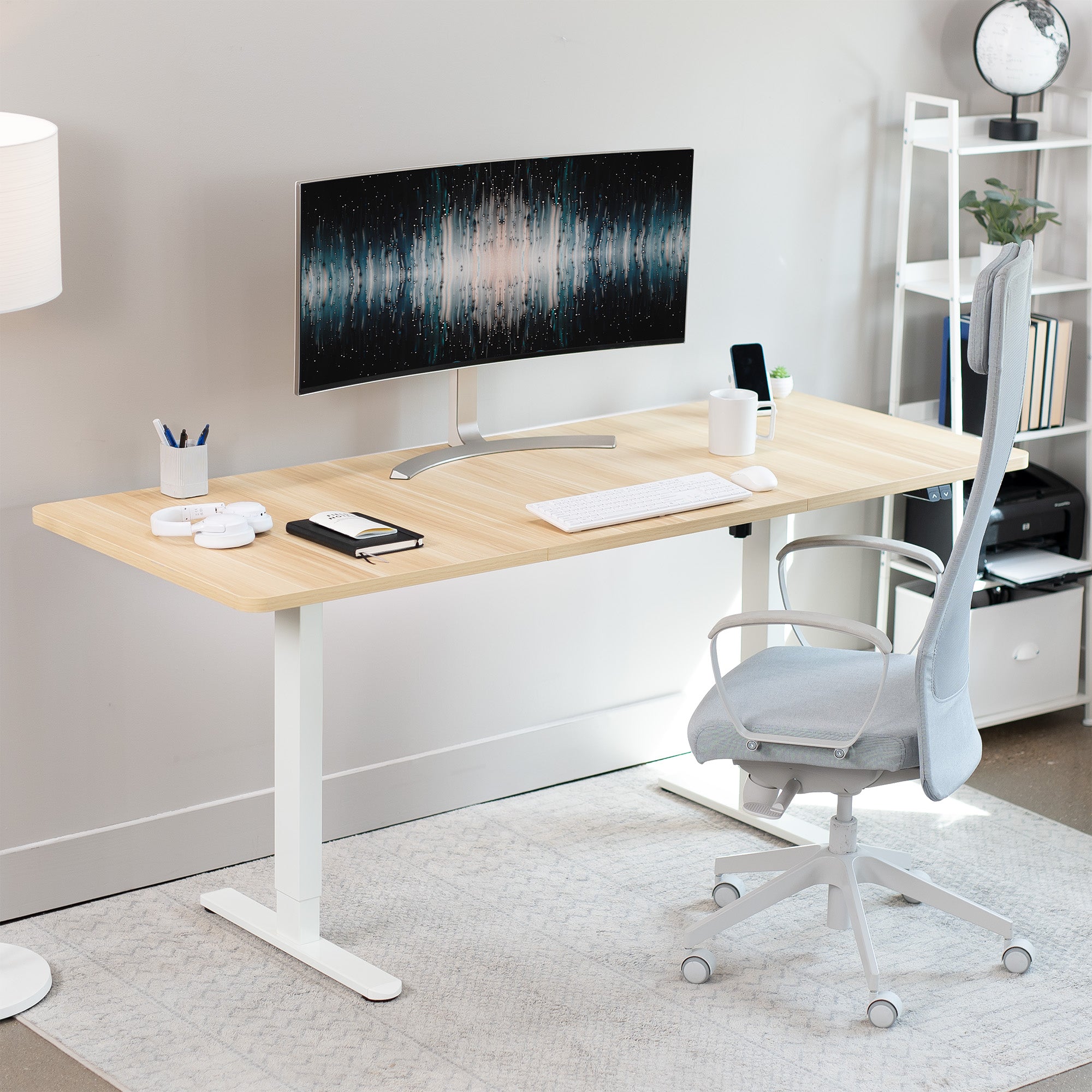 Wide surface sturdy sit or stand active workstation with adjustable height using 2 button control panel.