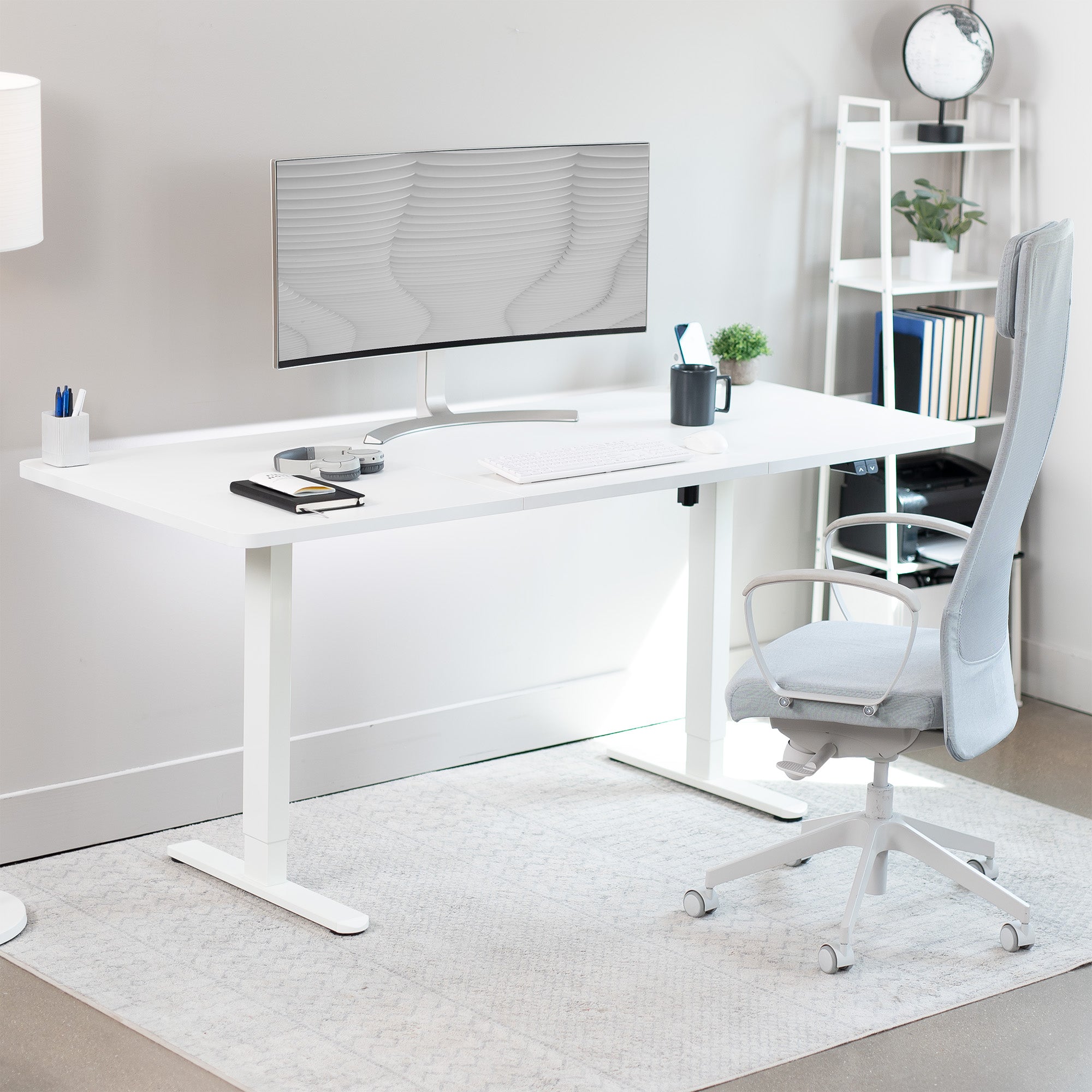 Wide surface sturdy sit or stand active workstation with adjustable height using 2 button control panel.