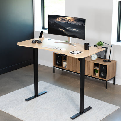 Sit to stand height adjustable electric desk with push button memory controller for ergonomic office workstation.