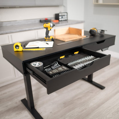 Heavy-duty electric height adjustable desk with drawers, built-in power strip, and memory controller.