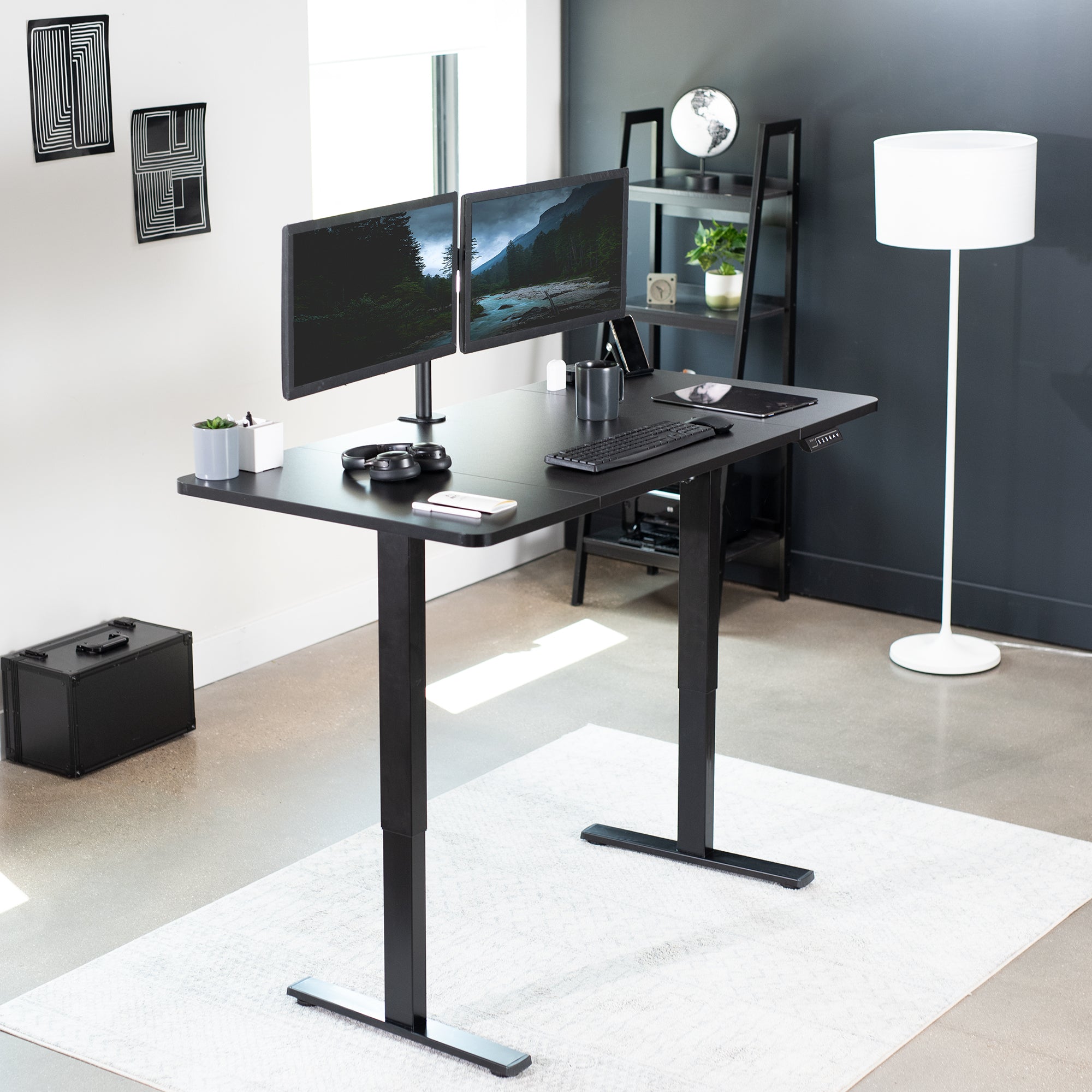 Sturdy ergonomic sit or stand active desk workstation with adjustable height using smart control panel.