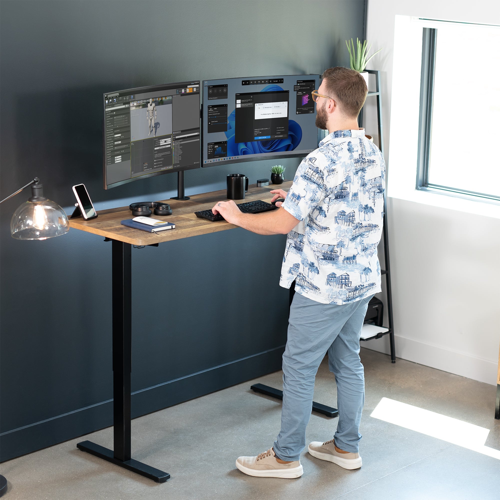 Sturdy wood plank pattern ergonomic sit or stand active desk workstation with adjustable height using smart control panel.