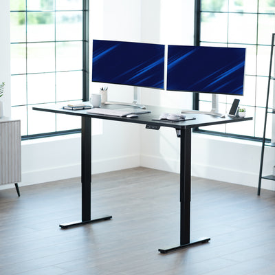 Large sturdy sit or stand modern desk with electric height adjustment options.