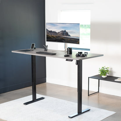 Large sturdy sit or stand active workstation with adjustable height using smart control panel.