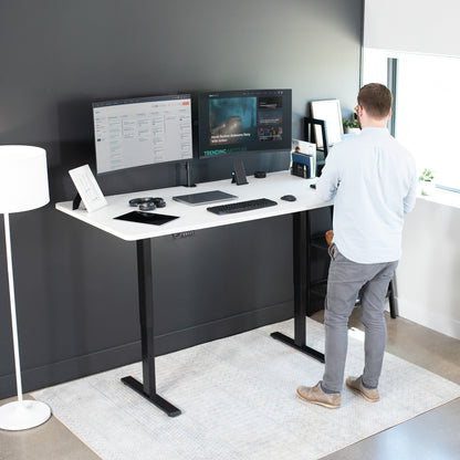 Large sturdy sit or stand active workstation with adjustable height using smart control panel.