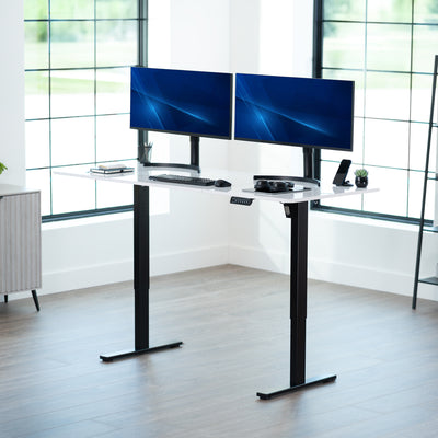 Large sturdy sit or stand modern desk with electric height adjustment options.
