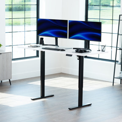 Large sturdy sit or stand modern desk with electric height adjustment options.