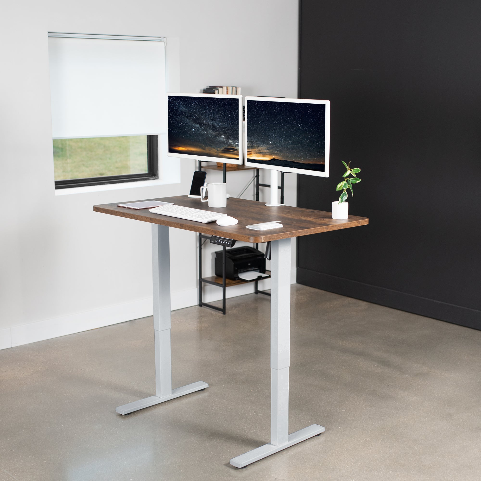 Rustic sturdy ergonomic sit or stand active desk workstation with adjustable height using smart control panel.