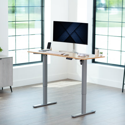 Sturdy ergonomic sit or stand active desk workstation with adjustable height using smart control panel.