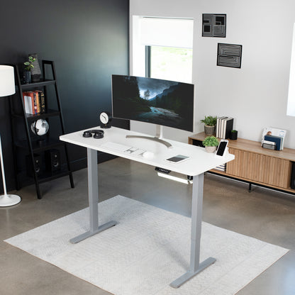 Sturdy ergonomic sit or stand active desk workstation with adjustable height using smart control panel.