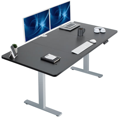 Large sturdy sit or stand modern desk with electric height adjustment options.