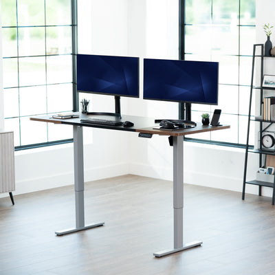 Large sturdy sit or stand modern desk with electric height adjustment options.