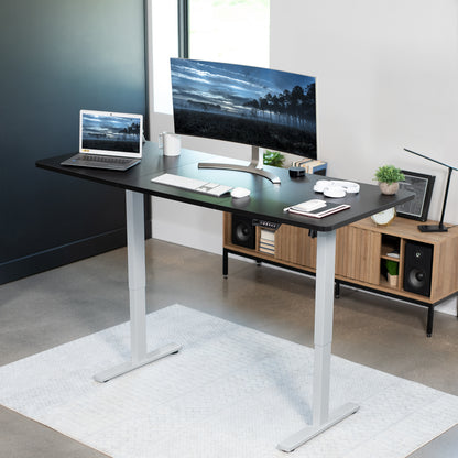 Large sturdy sit or stand active workstation with adjustable height using smart control panel.