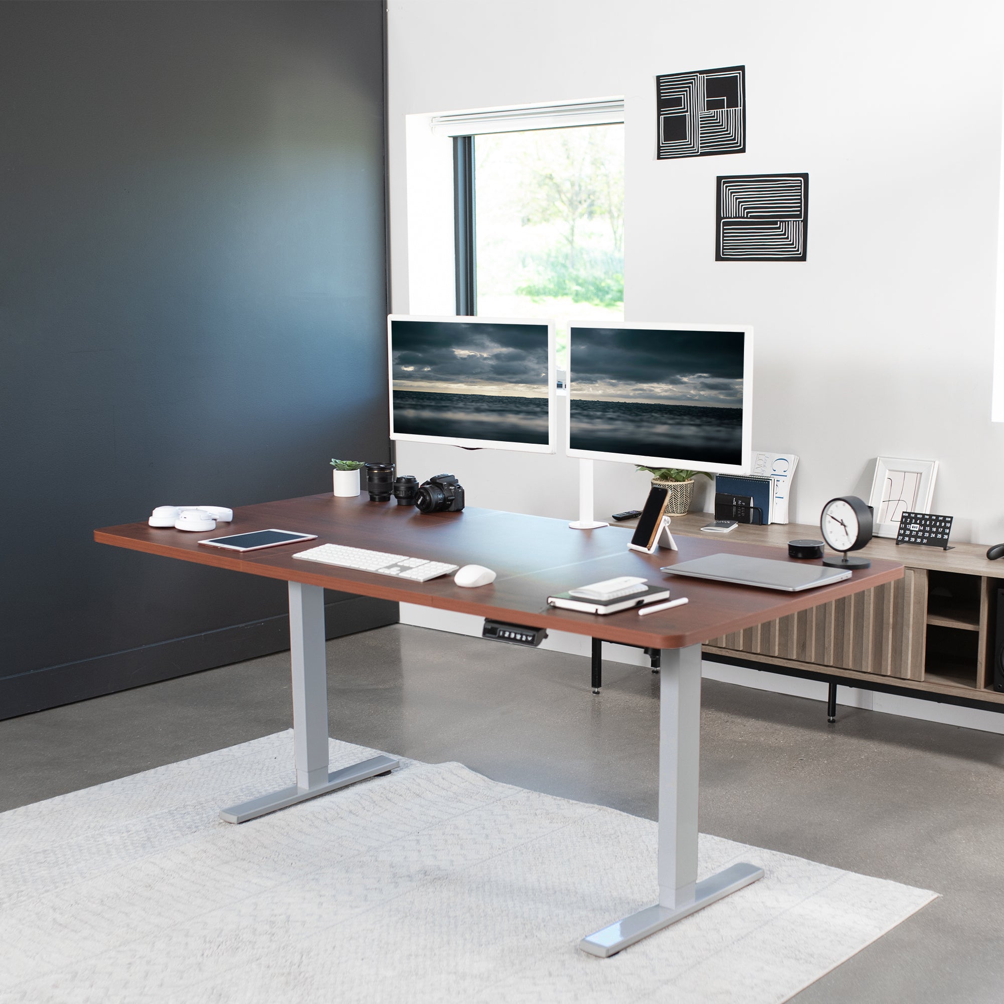 Large sturdy sit or stand active workstation with adjustable height using smart control panel.