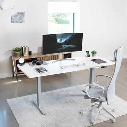 Large sturdy sit or stand active workstation with adjustable height using smart control panel.